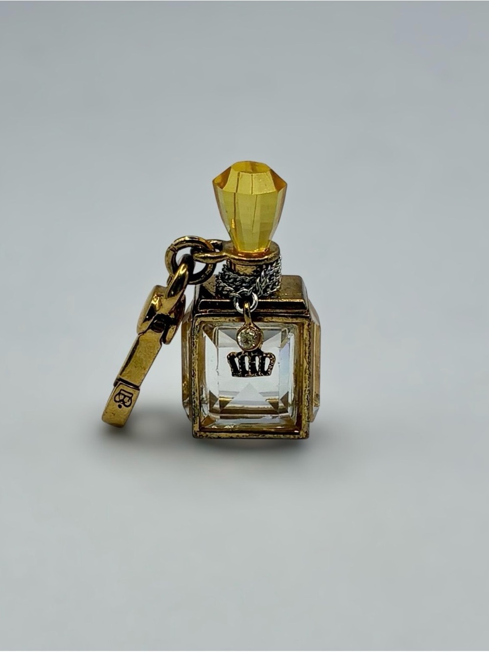 Juicy Couture Gold Tone Crystal Perfume Bottle Charm